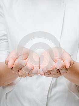 Close up of womans cupped hands
