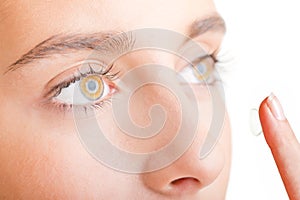 Close up of Womans Face Inserting a Contact Lens