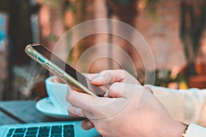 Close Up Of women hand using mobile phone