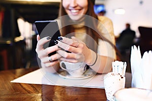 Close up of women`s hands holding cell telephone with blank copy space scree for your advertising text message or