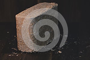 Close-up of a wood briquettes, pressed sawdust