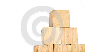 Close up at wood cube arrange in pyramid shape ,business concpt