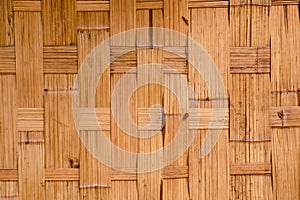 Close up wood texture detail of abstract yellow-brown bamboo stick pattern, japanese building material for background, backdrop or