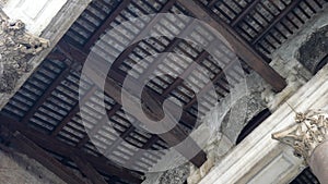 Close-up of wooden beams of ancient Roman Pantheon in Rome center, detail shot, nobody, low angle view. Concept of