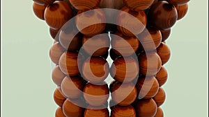 Close up of wooden brown sphere falling inside the falling apart figure of small balls. Design. Shape of balls