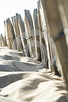 Close up of Wooden fence with blurred details on the beach
