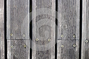 Close up wooden plank texture with screws, background