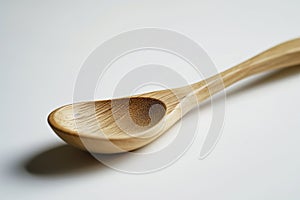 Close-up wooden spoon isolated on white background.