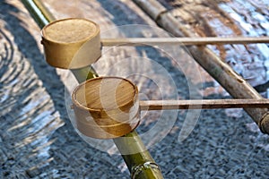 Close up of wooden spoons in a japanese shinto temple