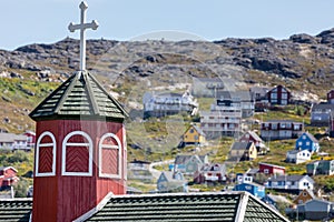 Close up of wooden Steeple and cross of Saviors Church in Qaqortoq, Greenland