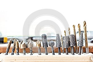 Close-up woodwork tool set. Rasp-file burr countersink kit. Carpentry woodworking workshop concept photo