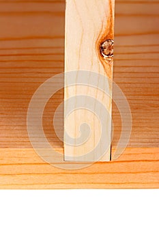 Close-up of a woodworking dado joint isolated vertical photo