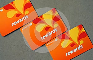 Close-up of Woolworths Rewards loyalty cards. Woolworths Supermarkets is an Australian grocery store chain