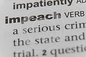 Close up of the word impeach