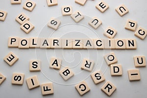 Close-up of the word polarization, word of the year 2023 in Spain declared by Fundeu