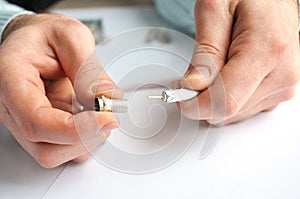 Close-up of a Worker Hands and Mounted TV Connector for Coaxial Cable