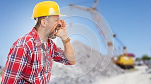 Close-up of worker making sound amplification gesture with hands