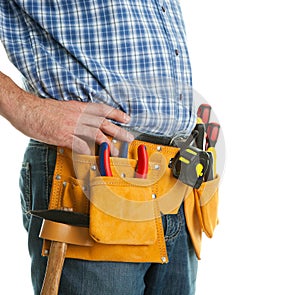 Close-up on worker's toolbelt photo