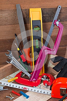 Close up working tools concepts, Carpentry construction hardware tools in the box. Set of working tools in wooden box.