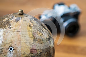 Close-up on a world map with a camera