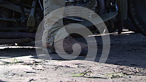 Close up of ww2 US soldier foot with motorcycle