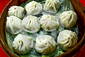 Close-up of the Xiao Long Bao or soup dumpling in bamboo steamers.