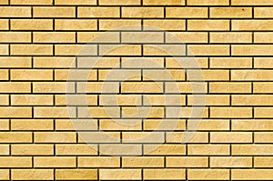 Close up of yellow brick wall