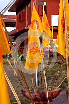 Close up of yellow Buddhist flags (The Dharmacakra flag)