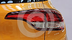 The close up of yellow car back light.