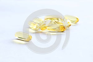 Close up yellow Cod Liver Oil capsule on white background