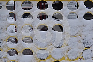 Close up yellow game covered in snow