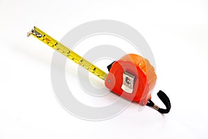 Close up yellow measuring tape isolated on white background. Tape measure is a measuring tools for construction. Measurement in in