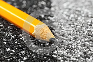 Yellow Pencil on Carpet