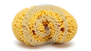 A yellow sponge on a white background (ai generated)