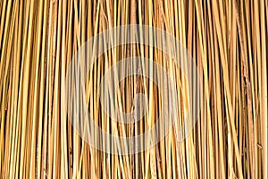 Close up of yellow striped straw texture as background