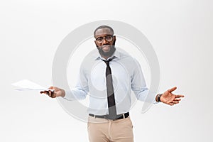 Close up Young African-American Businessman with Looking at the Camera While Holding Document Paper