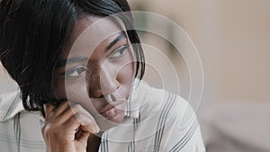 Close-up young african american woman sad worried girl feeling anxious sadness depressed upset female suffering from