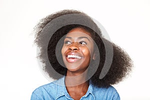 Close up young african american woman smiling and looking up