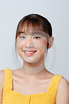 Close up of young Asian beautiful woman with smiley face
