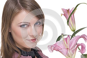 Close up of young beautiful woman with flower