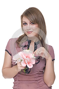 Close up of young beautiful woman with flower