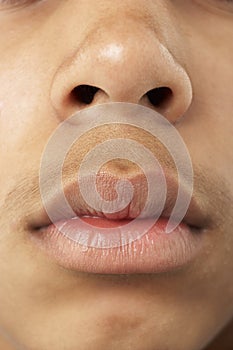 Close-Up Of Young Boy's Mouth And Nose