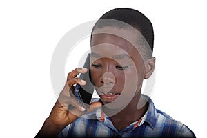 close-up of a young boy talking on the cell phone