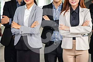 Close-up of Young business people team standing with arms crossed, Success Teamwork Concepts