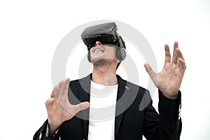 Close up.young businessman in a virtual reality helmet.
