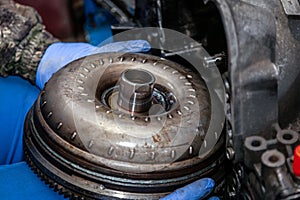 Close-up of a young car repairman