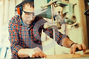 Close up of a young carpenter at work