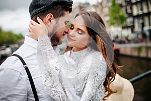 Close up of the young Caucasian beautiful woman and handsome man on their wedding day