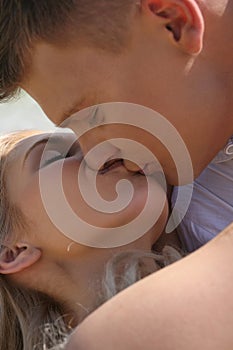 Close-up of young couple kissing