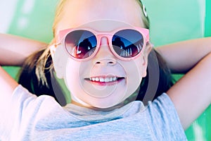 Close-up Of A Young Happy Girl Lying In Hammock